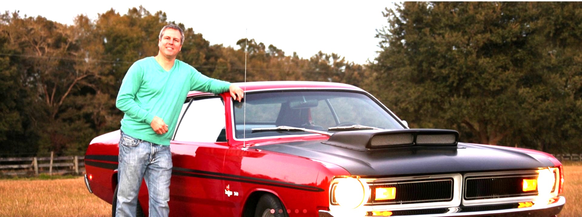 Chris Johnson Jr with a 1971 Dodge Dart Demon at sunset